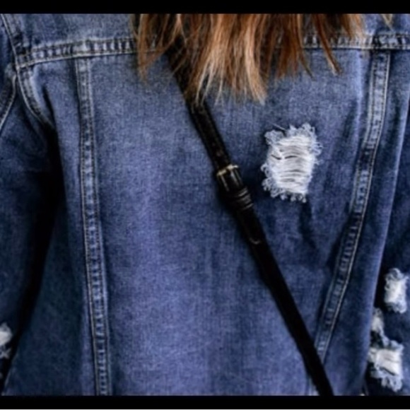 Denim jacket with distressed and raw hem design to highlight your chic style - Picture 4 of 10